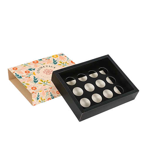 Custom punch partition inserts in a slider box for candies and toffees